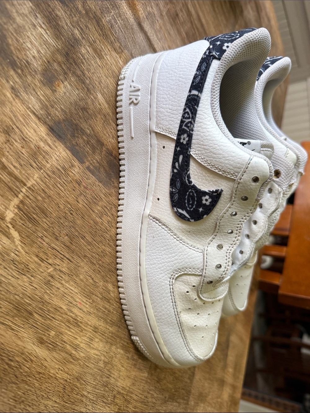 Nike Kids White Sneakers with Black Paisley Swoosh